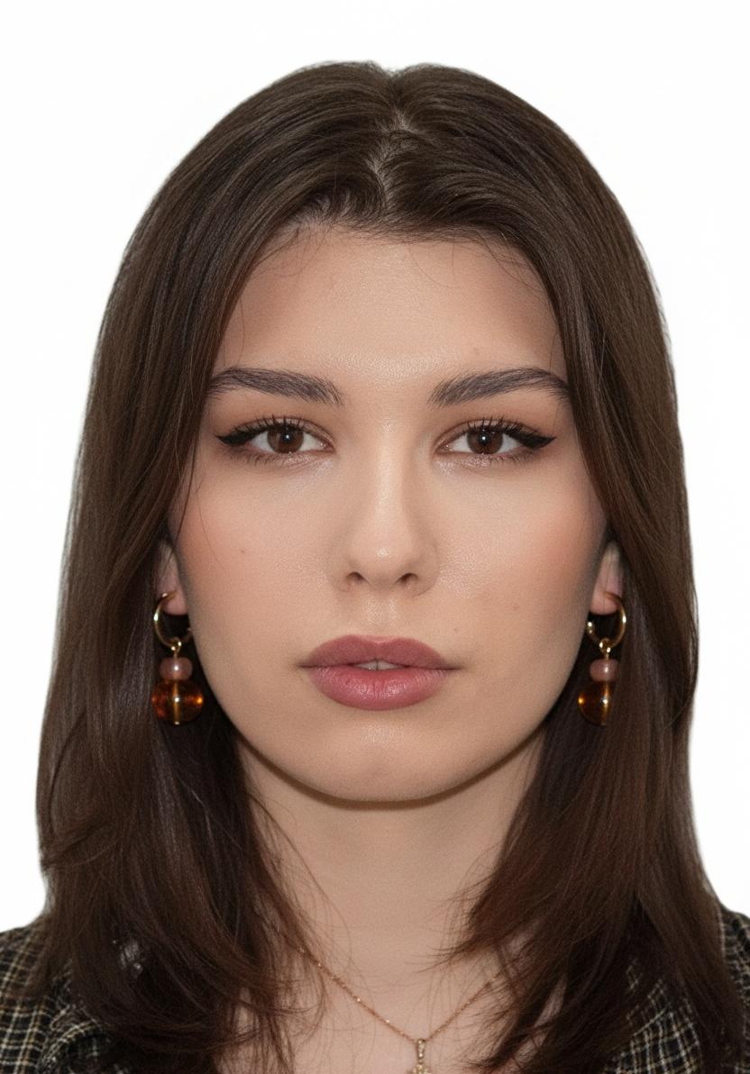 The same woman wearing the amber drop earrings