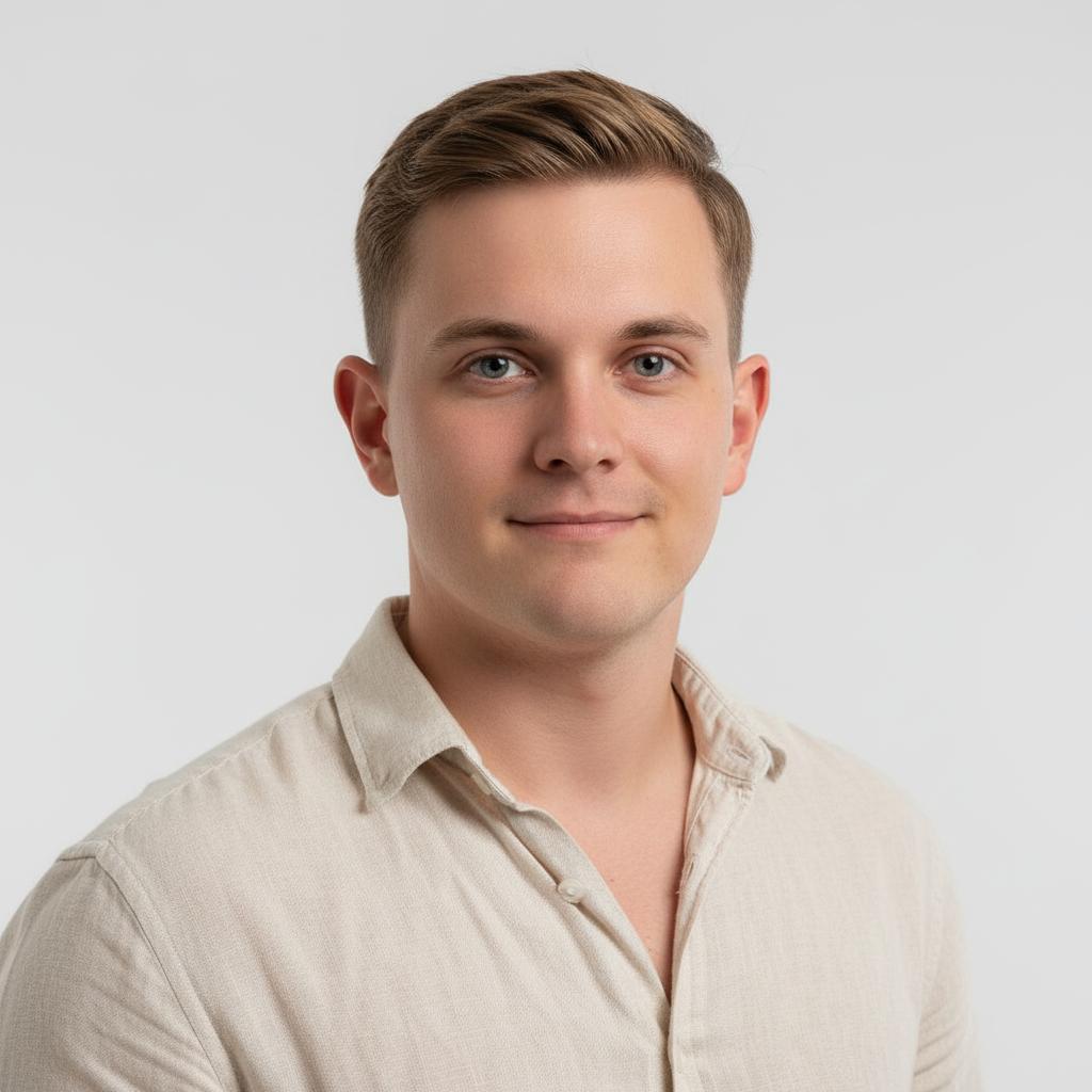 Professional headshot of a man in a linen shirt